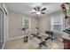 A simple room featuring a ceiling fan and weight training equipment at 309 Ackert Ave, Salisbury, NC 28144