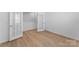 Office space with light hardwood floors and glass French doors at 3124 Beacon Heights Rd, Indian Land, SC 29707