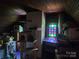 Attic space with window feature and retro television at 425 W Horah St, Salisbury, NC 28144