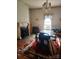 Dining room featuring a decorative fireplace and elegant chandelier, waiting for clean up at 425 W Horah St, Salisbury, NC 28144