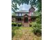 Charming two-story home with a large porch and intricate architectural details at 425 W Horah St, Salisbury, NC 28144