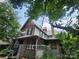Exterior view of two-story home with fence and mature trees at 425 W Horah St, Salisbury, NC 28144