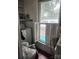 Small laundry area with window and vintage shutters at 425 W Horah St, Salisbury, NC 28144