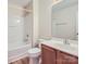 Bathroom featuring a tub and shower combo and a single sink vanity at 463 Delta Dr, Fort Mill, SC 29715