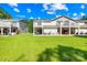 Expansive backyard featuring well-maintained green grass and a spacious patio area at 49009 Dockside Ln # D, Albemarle, NC 28001