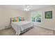 Cozy bedroom with soft carpet, natural light, and a charming view at 49009 Dockside Ln # D, Albemarle, NC 28001