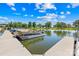 Waterfront view showing a boat docked on the lake, providing a serene and recreational lifestyle at 49009 Dockside Ln # D, Albemarle, NC 28001