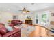 Inviting living room with hardwood floors, comfortable seating, and access to an outdoor patio at 49009 Dockside Ln # D, Albemarle, NC 28001