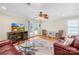 Spacious living room with hardwood floors, plush seating, and access to an outdoor patio area at 49009 Dockside Ln # D, Albemarle, NC 28001