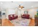 Bright living room featuring hardwood floors, comfortable sofas, and a stylish area rug at 49009 Dockside Ln # D, Albemarle, NC 28001