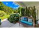 Cozy porch with comfortable seating and a view of the lush greenery at 49009 Dockside Ln # D, Albemarle, NC 28001