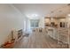 Open floor plan combining kitchen, workstation, and light wood flooring at 516 Fair Oaks Dr, Fort Mill, SC 29708