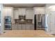 A well-equipped kitchen boasts stainless steel appliances and ample cabinet space at 516 Fair Oaks Dr, Fort Mill, SC 29708