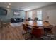 Bright and inviting living area with hardwood floors, comfortable seating, and abundant natural light at 5440 Kinsbridge Dr, Charlotte, NC 28227