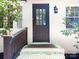 Charming front entrance with a freshly painted exterior, complemented by well-maintained landscaping at 6128 Coatbridge Ln, Charlotte, NC 28212