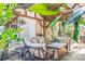 Inviting outdoor patio with a wooden pergola, providing comfortable seating and a serene ambiance at 6128 Coatbridge Ln, Charlotte, NC 28212