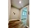 Small laundry room with wood flooring and washer/dryer hookups at 614 E Main Ave, Taylorsville, NC 28681