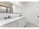 Bathroom features a dual sink vanity with marble countertops, and a large mirror at 627 West Main Ext, Lincolnton, NC 28092