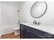 Well-lit bathroom with a vanity, toilet, bathtub and modern fixtures at 627 West Main Ext, Lincolnton, NC 28092