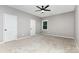 Neutral bedroom featuring soft carpeting, light gray walls and a ceiling fan at 627 West Main Ext, Lincolnton, NC 28092