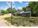 Attractive one-story house with gray siding, lush green lawn, and a welcoming entrance at 627 West Main Ext, Lincolnton, NC 28092