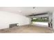 Spacious garage with an open door, natural light, and ample space for storage or projects at 627 West Main Ext, Lincolnton, NC 28092