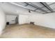 Large garage with overhead door and ample open space for parking or storage at 627 West Main Ext, Lincolnton, NC 28092