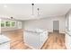 Bright open kitchen featuring white island, marble countertops, and modern appliances at 627 West Main Ext, Lincolnton, NC 28092