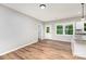 Bright living room features wood floors, white trim and windows that let in natural light at 627 West Main Ext, Lincolnton, NC 28092