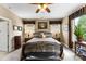 Cozy bedroom featuring a metal frame bed, matching nightstands with lamps, and neutral decor at 708 Ardent Trl, Belmont, NC 28012