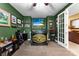 Stylish room with a custom wet bar, TV, and golf-themed decor at 708 Ardent Trl, Belmont, NC 28012