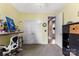 Bright office featuring neutral walls, carpet floors, closet storage, and outside view at 708 Ardent Trl, Belmont, NC 28012