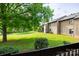 Well-maintained backyard area with plenty of green space and mature trees at 712 Mallard Head Ln, Mooresville, NC 28117