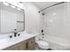 Bathroom with modern vanity, updated fixtures, and shower-tub combo at 712 Mallard Head Ln, Mooresville, NC 28117