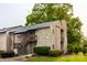 Condo exterior shows wood siding, a stone facade, exterior staircases, and mature landscaping at 712 Mallard Head Ln, Mooresville, NC 28117
