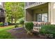 Exterior patio of home with green space and privacy bushes at 712 Mallard Head Ln, Mooresville, NC 28117