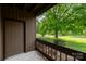 Cozy patio area with a view of lush greenery and a well-maintained lawn at 712 Mallard Head Ln, Mooresville, NC 28117