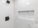 Close up of the modern shower features decorative mosaic tile and matte black hardware at 712 Mallard Head Ln, Mooresville, NC 28117