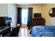 Comfortable bedroom with hardwood floors, a workspace, and a serene atmosphere at 727 Cove Rd, Gastonia, NC 28052