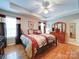 Bright bedroom with hardwood floors, a large window, and ample closet space at 727 Cove Rd, Gastonia, NC 28052
