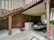 Under the deck storage area with kayak, generator, and brick foundation at 727 Cove Rd, Gastonia, NC 28052