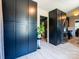 Pantry with modern black cabinetry and stainless steel appliances in kitchen at 7521 Surreywood Pl, Charlotte, NC 28270