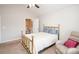 Inviting bedroom boasts a ceiling fan, vaulted ceiling, and en-suite bathroom for added convenience and privacy at 8183 Sultana Cir, Charlotte, NC 28227