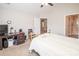 Comfortable bedroom features an en-suite bathroom, ceiling fan, and carpeted floors, creating a relaxing atmosphere at 8183 Sultana Cir, Charlotte, NC 28227