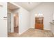 Open dining area that transitions to hallway and adjacent to the kitchen at 8183 Sultana Cir, Charlotte, NC 28227