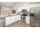 Bright kitchen with modern appliances and sink with granite countertop at 8183 Sultana Cir, Charlotte, NC 28227