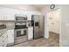 Modern kitchen with stainless steel appliances and granite countertops at 8183 Sultana Cir, Charlotte, NC 28227