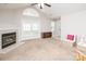 Spacious living area showcasing a fireplace and French doors, filled with natural light at 8183 Sultana Cir, Charlotte, NC 28227