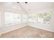 Bright sunroom with multiple windows allowing natural light in at 8183 Sultana Cir, Charlotte, NC 28227