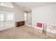 Inviting living area with neutral tones, French doors, and an abundance of natural light at 8183 Sultana Cir, Charlotte, NC 28227